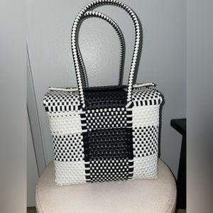 Woven plastic handbag